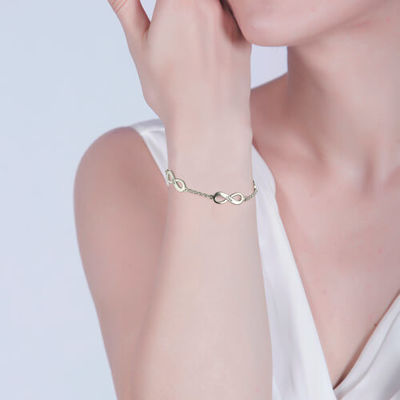 braccialetto solido di infinito di triplo dell'oro 18k dei braccialetti d'argento su ordinazione di 0.18oz 0.79cm